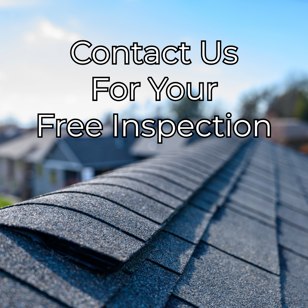 Close-up view of an asphalt shingle roof ridge with ridge vent installed on a residential home